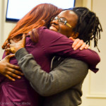 Oldsmar City Council member Linda Norris hugs artist Lakeema Matthew after her public art mural project was approved by the council in January.