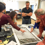 USF Professor Taryn Sabia (L) points out something in Team Norris' plans.