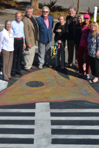 North Pinellas Cultural Alliance officials pose at the site of the bonefish crosswalk at the Dunedin Marina in early December 2016.