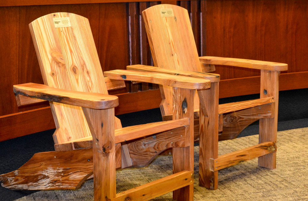 The Oldsmar Chair Project was a collaboration between the city and Odessa woodcarver Ray Poynor, recreating iconic Adirondack chairs from the city's history using 100-year-old native heart pine wood.