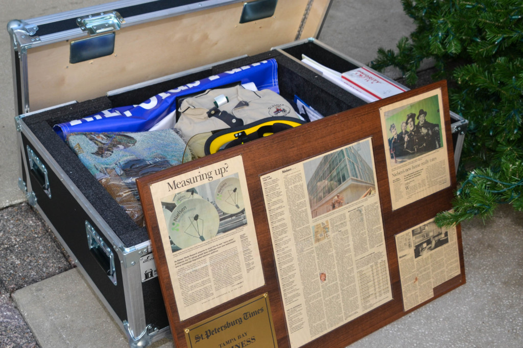 Items included in Oldsmar's time capsule include postcards, menus, clothing, toys, a signed fire helmet and a bust of former mayor and current city council member Jerry Beverland.