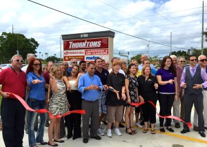 Oldsmar City officials and local merchants were on hand for the 8-in-1 ribbon cutting ceremony at Forest Lakes Plaza on Friday, July 31, 2015.