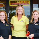 Hungry Howies owners Julie Cavalcanti (L) and Jennifer Hearn (R) with employee Lynda McBrayer.