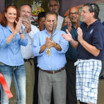Vinor Rishi (center) is flanked by Oldsmar Mayor Doug Bevis and Council member Linda Foley Norris.