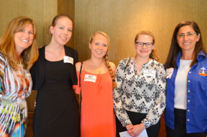 Astronaut Nicole Stott poses with members of East Lake High School's Academy of Engineering.