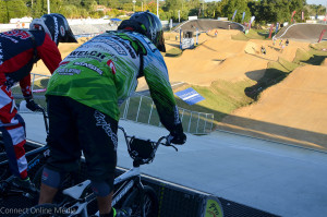 Riders prepare to go down the 20-foot hill at Oldsmar's BMX Supercross track.