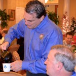 Oldsmar Mayor Dog Bevis serves coffee to City Manager Bruce Haddock at the 2013 Mayor's Breakfast.