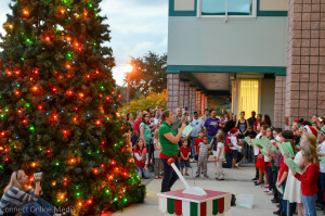 The Oldsmar Elementary School choir performs during the city's second annual tree lighting ceremony on Tuesday, Dec. 1, 2015.