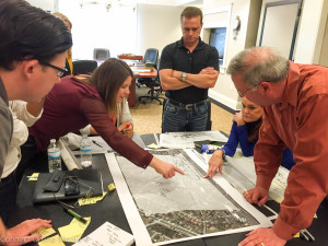 USF Professor Taryn Sabia (L) points out something in Team Norris' plans.