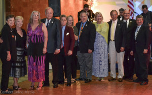 Oldsmar officials pose with members of R.E. Olds's family during the Centennial Dinner Dance at Nielsen on Thursday night.