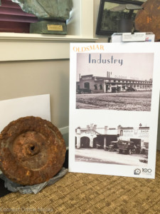 Council Member Jerry beverland brought the flywheel to the Oldsmar Historical Society museum.