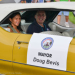 Oldsmar Mayor Doug Bevis rides in the Centennial Parade on Saturday.