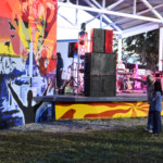 A couple examines the new mural at Oldsmar's R.E. Olds Park on Friday.